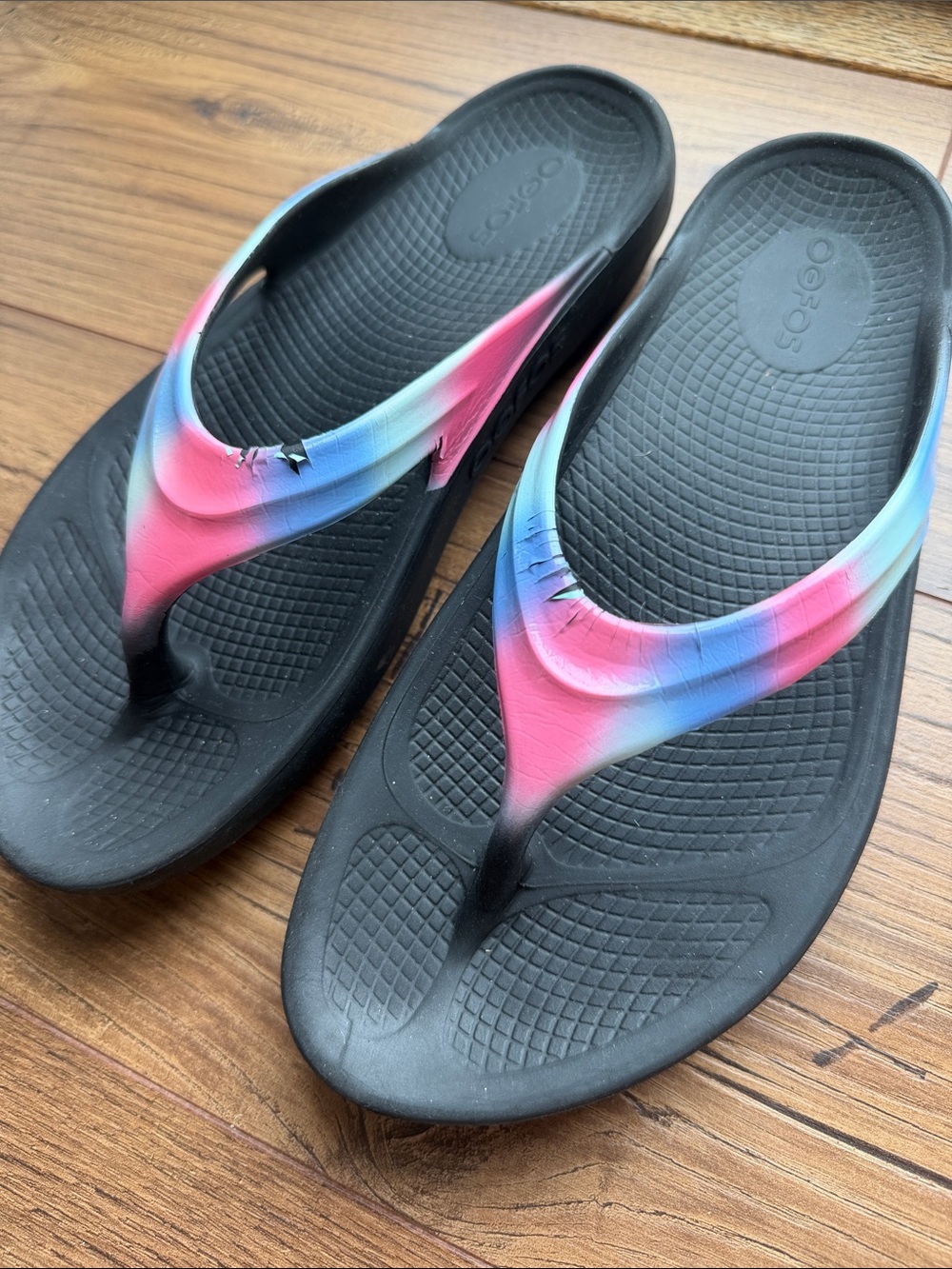 OOFOS Black Flip Flops with Pink-Blue Ombre Straps